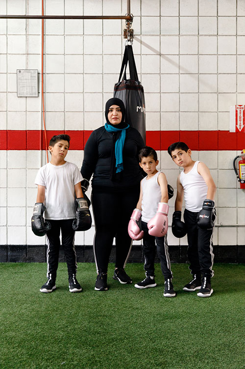 Zahraa and her sons at a boxing gym